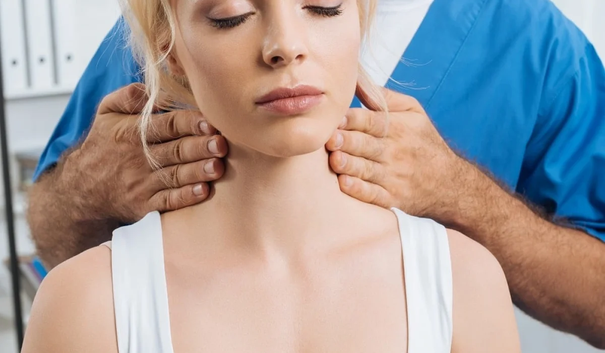 A woman being massaged by a therapist of Capstone Physical Therapy & Fitness